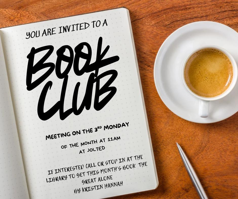 a book, pen, and cup of coffee