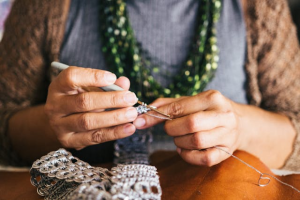 person knitting